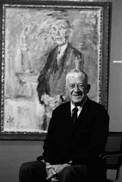 Konrad Adenauer seated in front of the portrait painted by Oskar Kokoschka in 1966